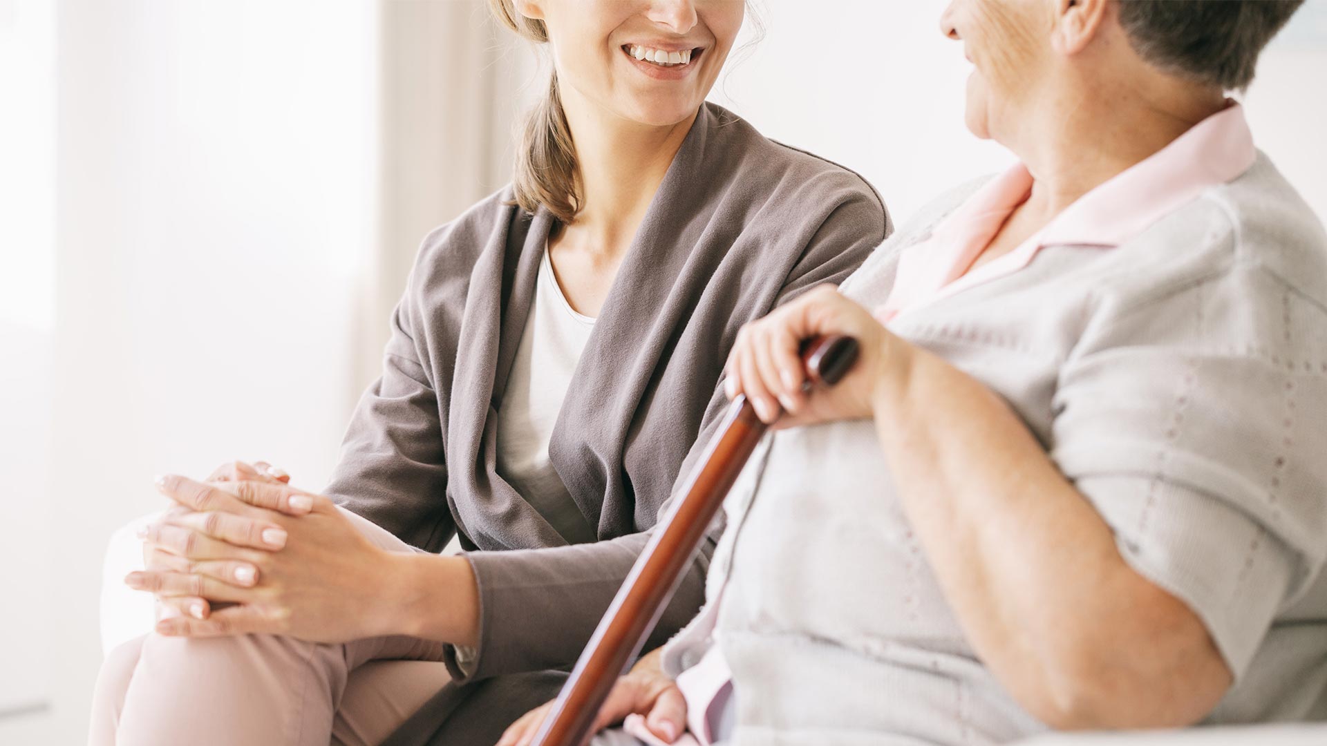 Private care worker with elderly woman